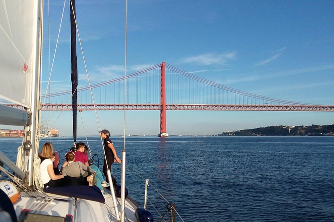 Lisbon Sailing Tour on a Luxury Sailing Yacht with 2 Drinks - Drinks and Portuguese Appetizers: The Mid-Cruise Sweet Spot