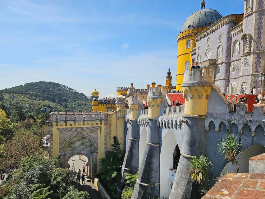 Lisbon: Sintra, Pena, Cabo da Roca Coast & Cascais Day Tour - Cabo da Roca cliffs and Guincho Beach: dramatic coast, efficient stops