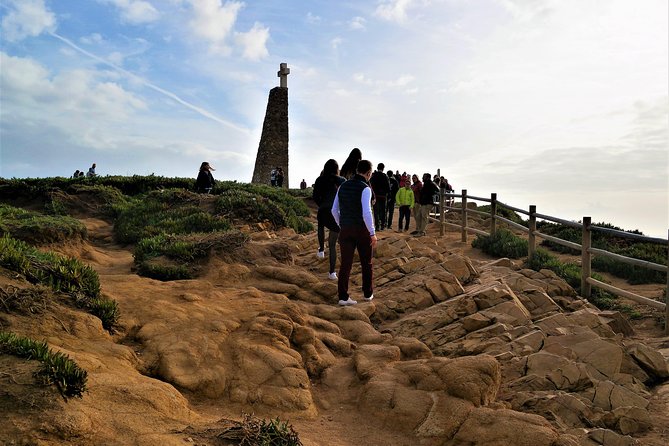 Lisbon: Sintra, Pena, Cabo da Roca Coast & Cascais Tour - The guide and minivan experience: what stands out in real service