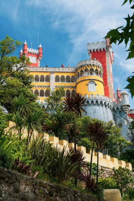 Lisbon: Sintra, Pena Palace, Cabo da Roca & Cascais Day Tour - Pena Palace Gardens and the hilltop castle, built for views