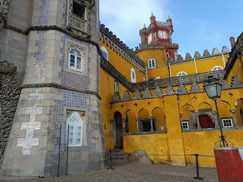 Lisbon: Sintra, Pena Palace, Moorish Castle & Regaleira Tour - Sintra Old Town break: photos, snacks, and getting your bearings