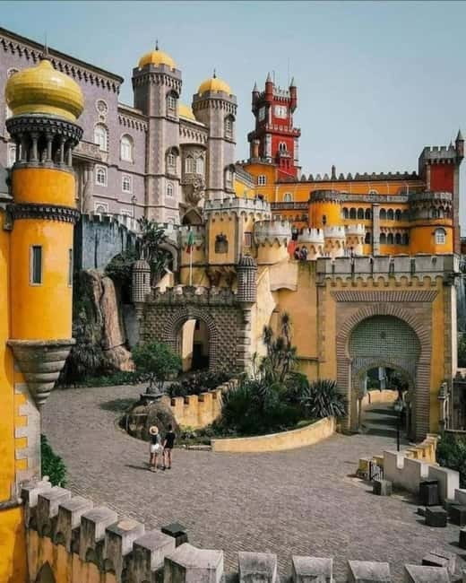 Lisbon: Sintra, Pena Palace, Moorish Castle & Regaleira Tour - Monserrate Palace pass-by: a quick taste of another Sintra style