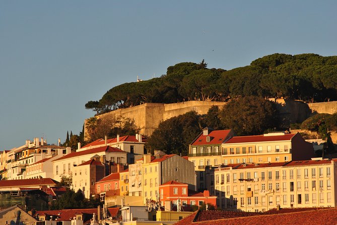 Lisbon Small Group Day Cruise with Historic Commentary & a Drink - Passing under the 25 de Abril Bridge like a mini Golden Gate moment