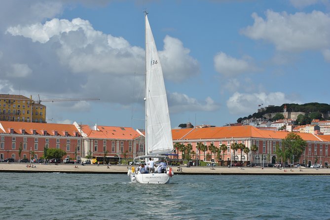 Lisbon Small Group Day Cruise with Historic Commentary & a Drink - Belém Tower from the water: fortress, port, and UNESCO vibes