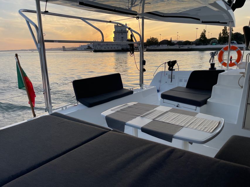 Lisbon: Sunset and Wine Luxury Catamaran Cruise - Cruising the Tagus: what two hours feels like at sunset