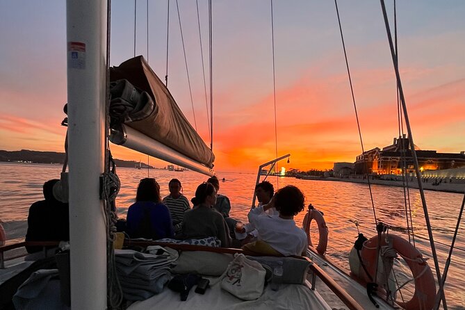 Lisbon Sunset Boat Cruise Tour With Drinks Included - Almada highlights: Christ the King statue and the river crossing