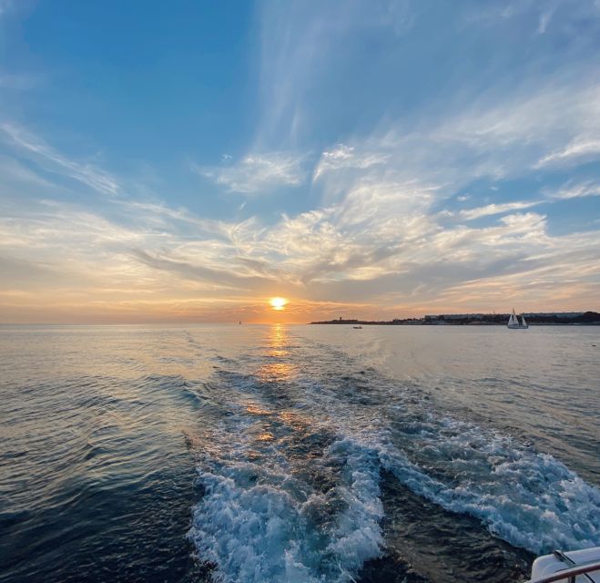 Lisbon: Sunset Boat Tour with Wine - The 25 de Abril Bridge and Commerce Square: Lisbon’s Big Icons at Water Level