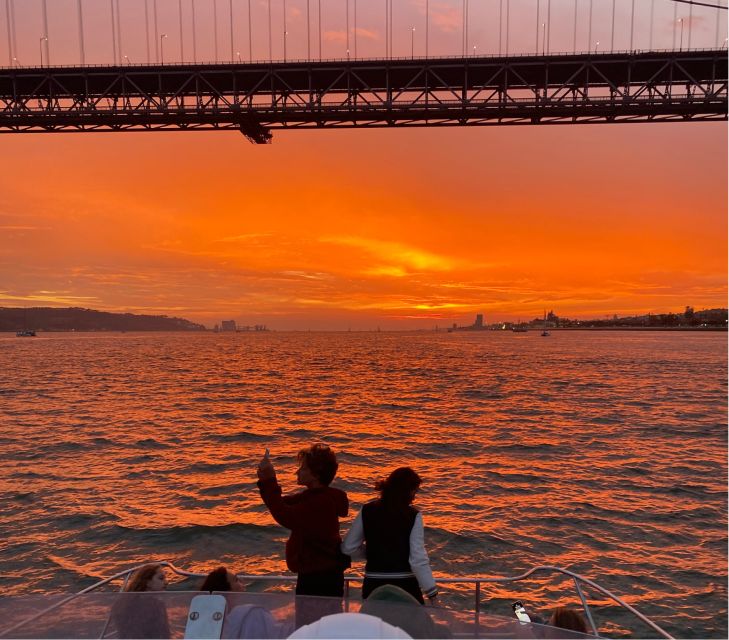 Lisbon: Sunset Boat Tour with Wine - Alfama and Christ the King: Old Streets and High Views, Explained While You Watch