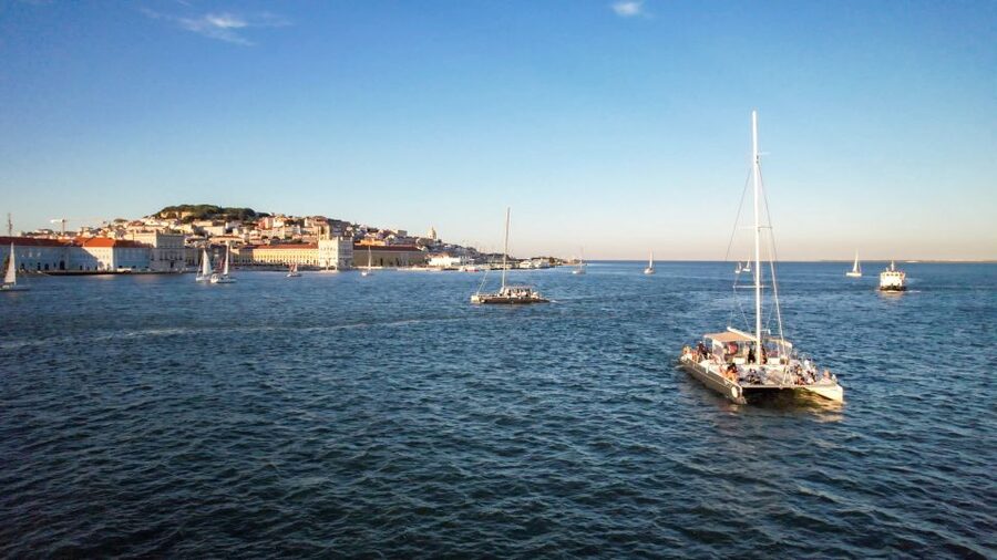 Lisbon: Sunset Catamaran Boat Tour with Music and Drinks - Music, Drinks, and That Relaxed Onboard Crowd Energy
