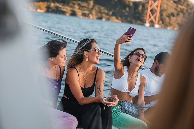 Lisbon: Sunset Catamaran Boat Tour with Music and Drinks - The Route Feeling: Big Lisbon Landmarks, No Heavy Rushing