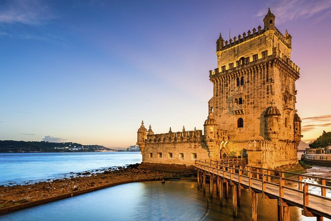 Lisbon: Sunset Catamaran Boat Tour with Music and Drinks - Christ the King Through the Bridge Framing Moment