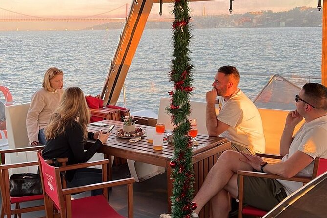 Lisbon: Sunset Catamaran Boat Tour with Music and Drinks - Tejo Power Station and the End-of-Trip Calm