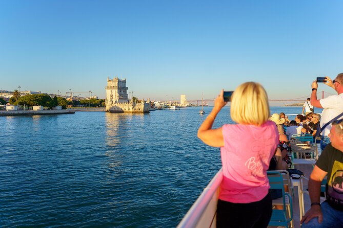 Lisbon Sunset Cruise with Wine and Snacks - The deck reality: where to sit for views, photos, and comfort
