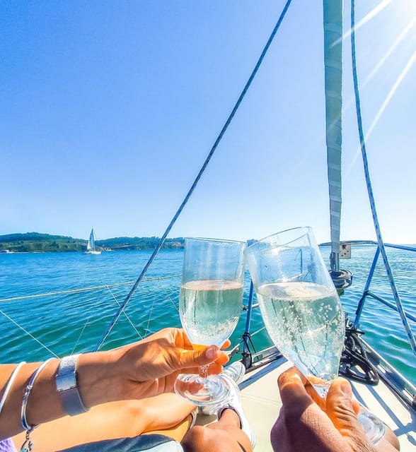 Lisbon: "Sunset" & "Day Tours" by boat, with drink and music - Why the Tagus at sunset changes how Lisbon looks