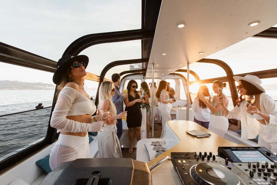 Lisbon: Sunset/Night Boat Party with Open Bar, Snacks & DJ - The Tagus route, stop by stop: what you see and what each moment feels like
