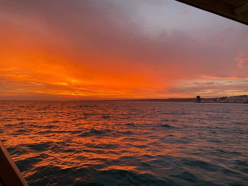 Lisbon: Sunset Sailing Boat Tour with Drinks - On board comfort: drinks, blankets, lounge, and a real bathroom