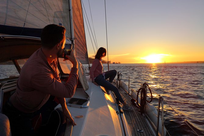 Lisbon Sunset Sailing Tour on Luxury Sailing Yacht with 2 Drinks - Weather Reality: Cold Wind Is the Main Consideration