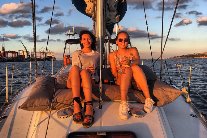 Lisbon Sunset Sailing Tour with White or Rosé Wine and Snacks - Almada skyline at sea level: Cristo Rei and the view across the Tagus
