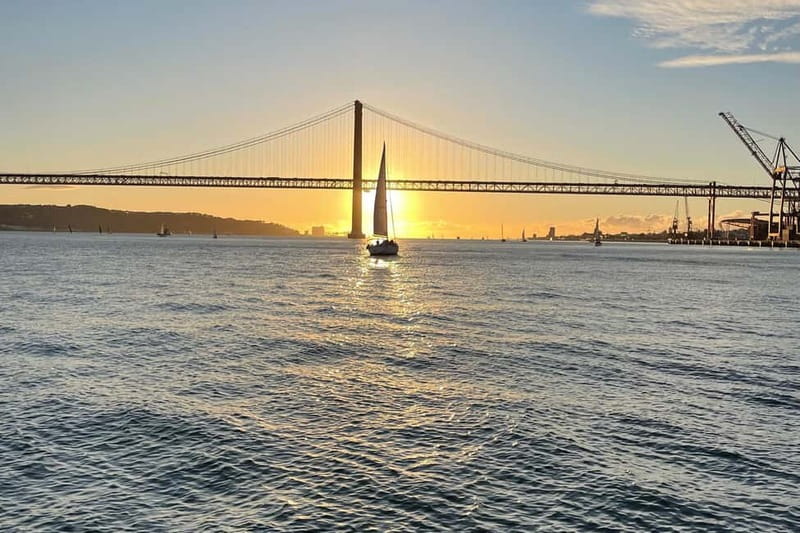 Lisbon: Sunset Sailing with Local Wine & Stunning Views - The onboard vibe: blankets, music, and a small-group pace