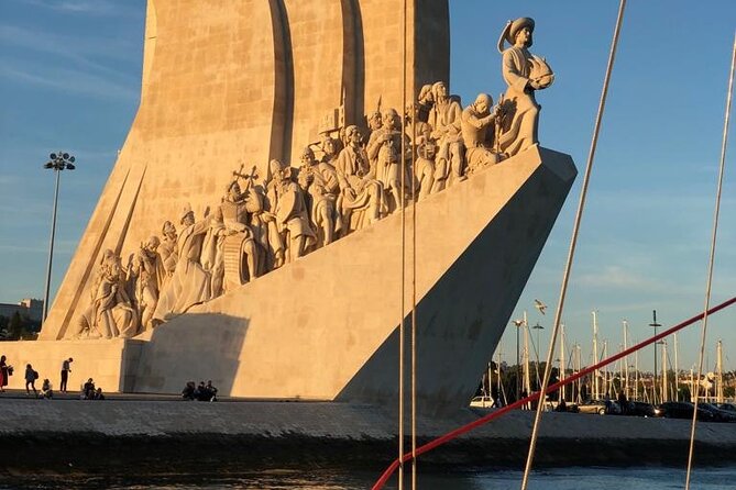 Lisbon: Sunset Sailing with Portuguese Wine and History - Passing the 25th of April Bridge: the “right at sunset” moment