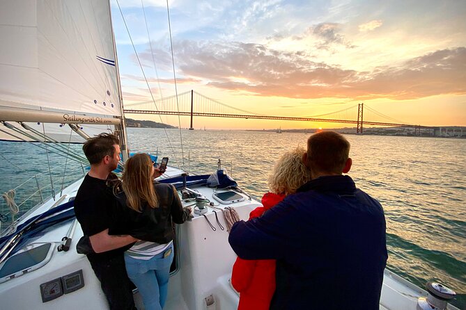 Lisbon: Sunset Tagus River Sailing Tour with Drinks - Sailing past Terreiro do Paço and the rebuilt Baixa