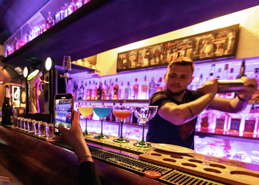 Lisbon: Tipsy Tour Fun Bar Crawl with a Local Guide - From Largo do Carmo to Bairro Alto: what the night feels like