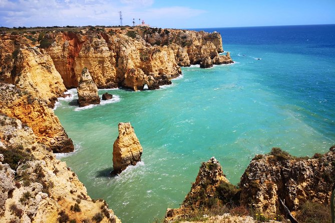 Lisbon to Algarve Private Tour: Benagil Caves Cruise & Top Sights - Lagos and Praia do Camilo: rock formations, beach beauty, and the Mediterranean mood
