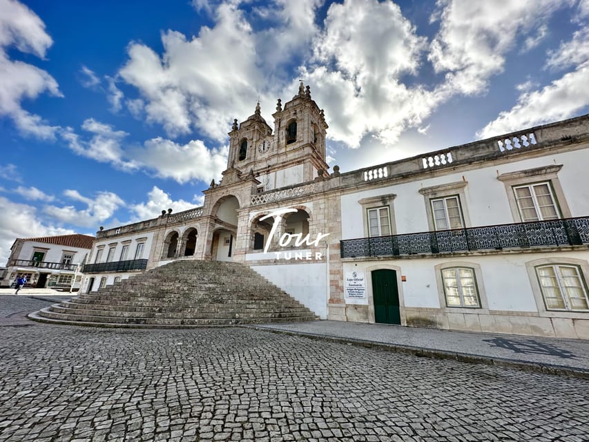 Lisbon: To Porto, Day Trip & Transfer with Stops in 3 Cities - Nazaré: golden sand, surf history energy, and big-wave scenery