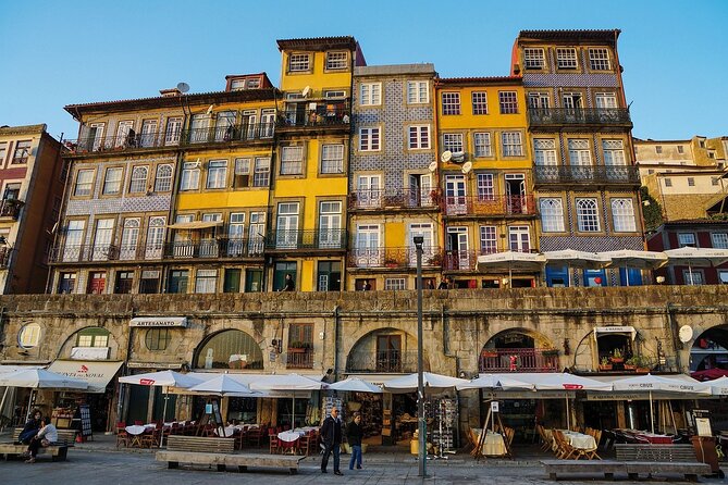 Lisbon to Porto or Porto to Lisbon private transfer - Nazaré: cliffs, Praia do Norte, and a shore-level surf show