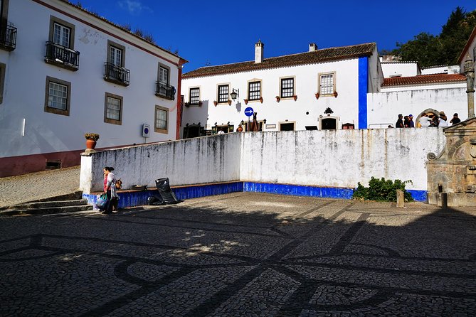 Lisbon to Porto Up To 5 Stops Óbidos Nazaré Fátima Coimbra Aveiro - Coimbra and Aveiro: a quick university panorama, then canals and sweets