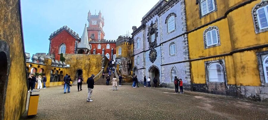 Lisbon: Tour to Pena Palace, Sintra, Cabo da Roca, Cascais - Sintra’s Streets, Regaleira Photo Stops, and Moorish Castle Moments