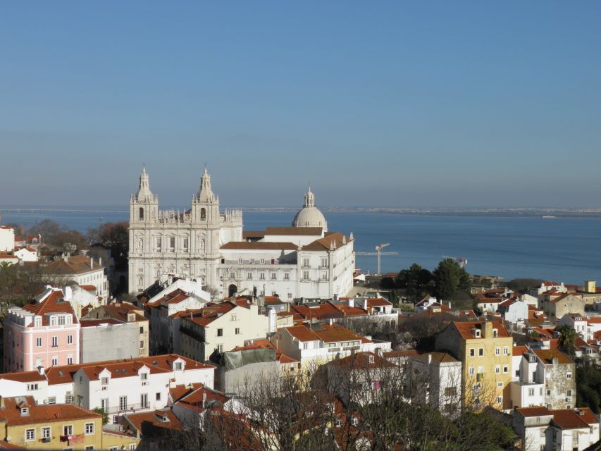 Lisbon: Tower of Saint George’s Castle Church Ticket & Drink - The bell tower climb: 50 steps, ringing bells, and skyline payoff