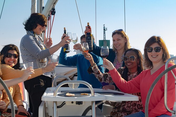 Lisbon: Wine Tasting with Sommelier on a Private Sailboat - Praça do Comércio and Alfama: Lisbon’s old center from across the Tagus