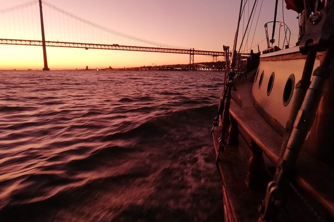 Marriage proposal on a Vintage Sailboat - The Tagus route: 25 de Abril Bridge, Belém Tower, and the modern riverfront