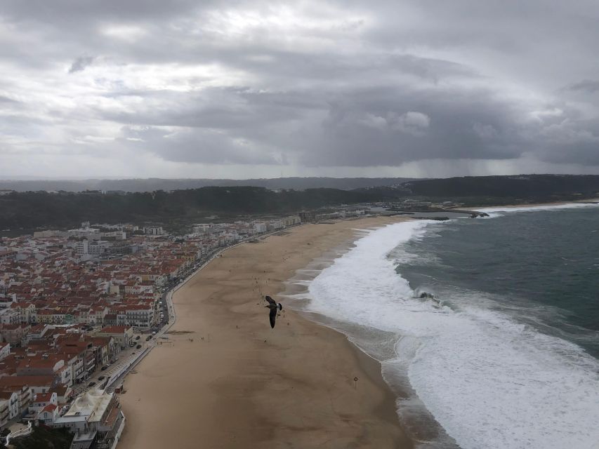 Nazaré: Big Wave Capital & Medieval Óbidos tour from Lisbon - Getting started: Cais do Sodré, pickup timing, and the day shape