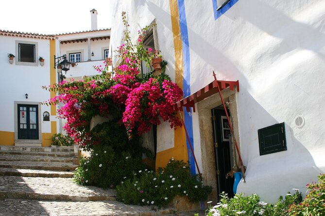 Nazare,Obidos, and Batalha Monastery Private Tour - Óbidos Town Gate to castle views, with time for the ginjinha