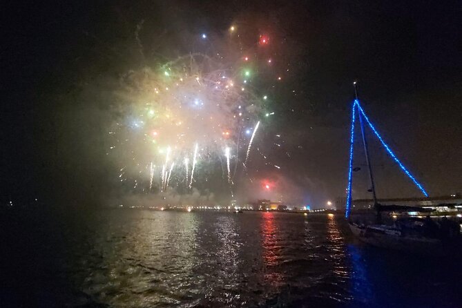 Passing the Year in a Boat with Champagne and Fireworks - Drinks, blankets, and the on-board party setup