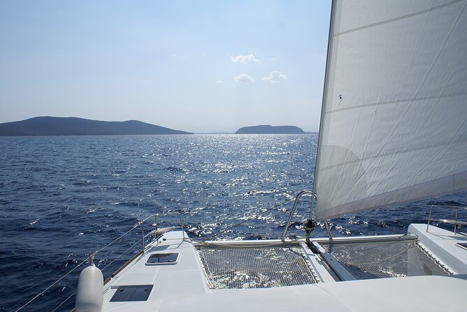 Private Catamaran Tour: Lisbon coast cruise with barbecue and drinks - What It Feels Like On Deck: Loungers, Sun, and a Real Swim Break
