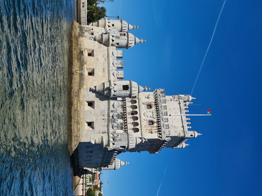 Private Lisbon Sightseeing Sailing Boat Tour with Locals - Onboard experience: captain, live narration, and the welcome drink
