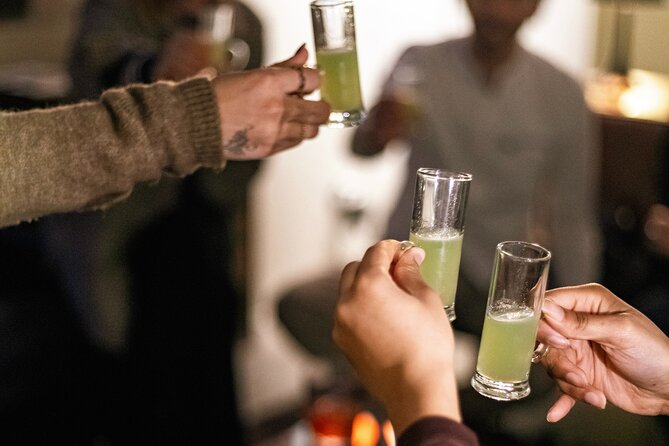 Private Night Bar Crawl in Lisbon with Local Guide and Drinks - Starting at Largo do Carmo: your first drink and a first lesson