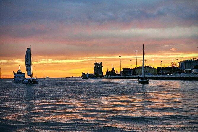Private Relaxing Sunset Tour along the Tagus River - On board comfort: wine, cheese and ham, and warm extras when it gets cooler