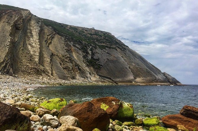 Private Safari Tour to Espichel Cape & West Coast Wild Beaches - Praia das Bicas: Clear Water, Wooden Steps, and No Fuss