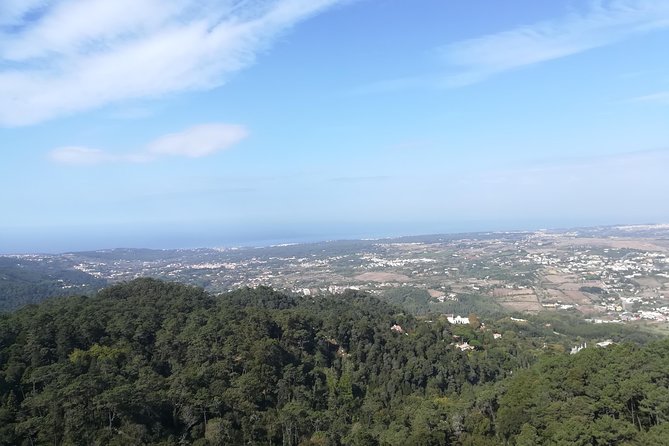 Private Sintra, Pena Palace, Cabo da Roca and Cascais Full Day - Monserrate Palace, cork tree views, and a fast photo stop style