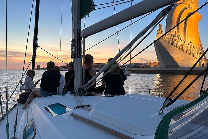 Private Sunset Sailing Boat Tour in Lisbon - 25 de Abril Bridge at sunset: scale you can actually feel