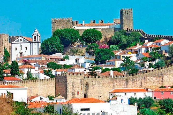 Private Tour Fatima-Batalha-Nazaré-Óbidos from Lisbon full day - Nazaré: lunch time, fishing-town atmosphere, and ocean views