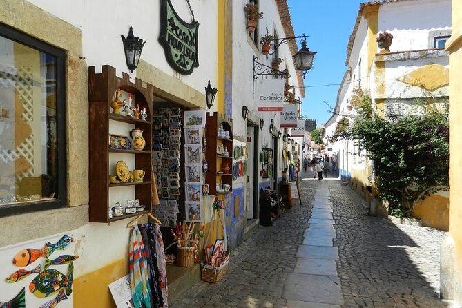 Private Transport Lisbon - Porto or Porto - Lisbon with 3 Stops - Fátima or Coimbra: pick one cultural stop, keep the day balanced