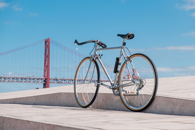 Riverside Ride Audio Adventure Lisbon to Belem - Dock District to the Bridge: Riverside Bike Path Views You Can Actually Use