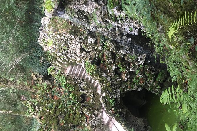 Sintra and Cascais with a Local Guide - Group tour starting from Sintra - Quinta da Regaleira: Caves, Towers, and Symbolic Details