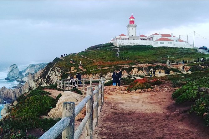 Sintra Half-Day Private Tour - A Journey through Wonderland - Stop 4: Quinta da Regaleira, caves, wells, and secret symbolism