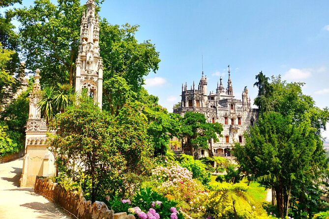 Sintra Half Day with Pena Palace and Regaleira from Lisbon - Quinta da Regaleira: gardens, grottoes, and the Initiation Well feeling